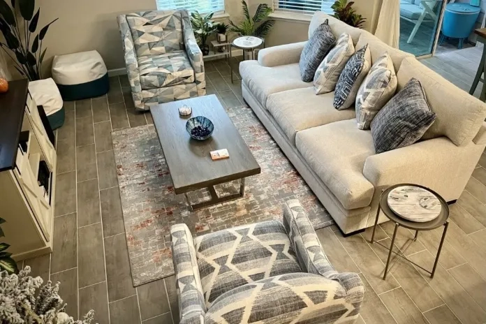 Image of living room with off-white sofas and cream accents
