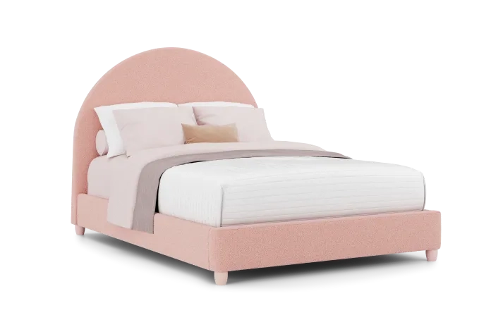 pink and white upholstered bed 