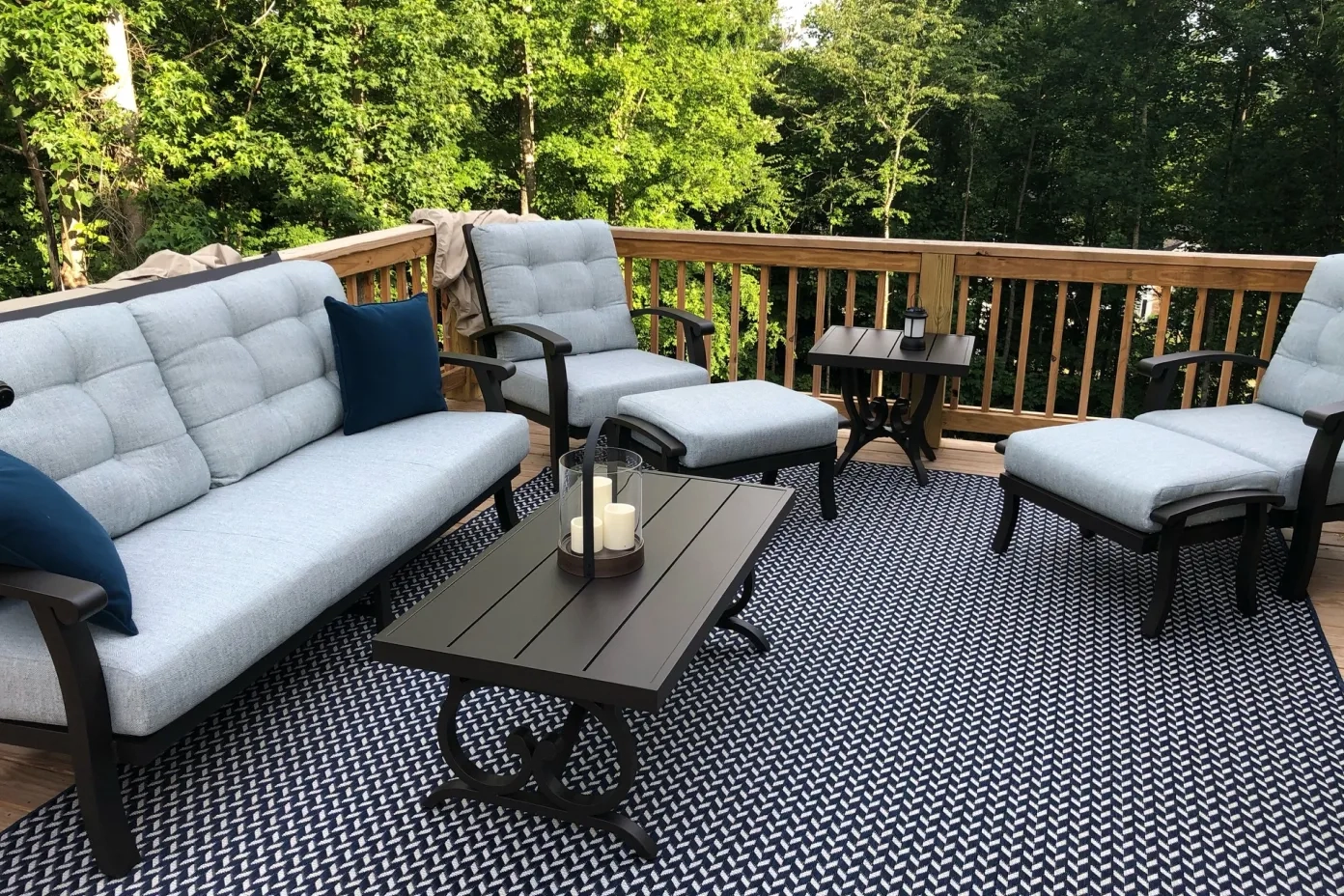 black outdoor sectional with coffee table
