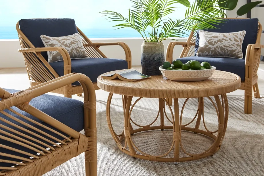 wooden patio chairs and table with blue cushions 