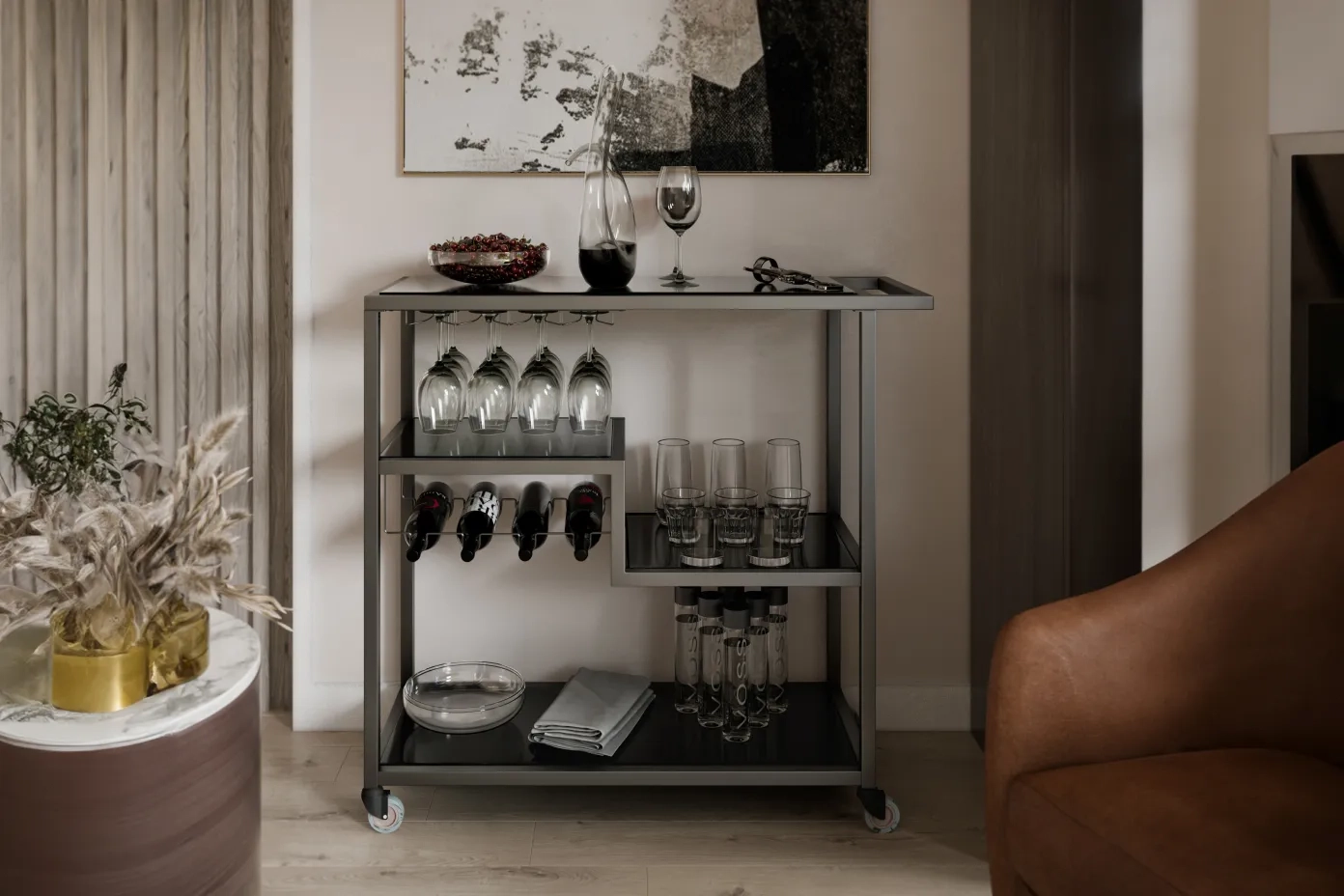 bar cart with wine bottles and wine glasses