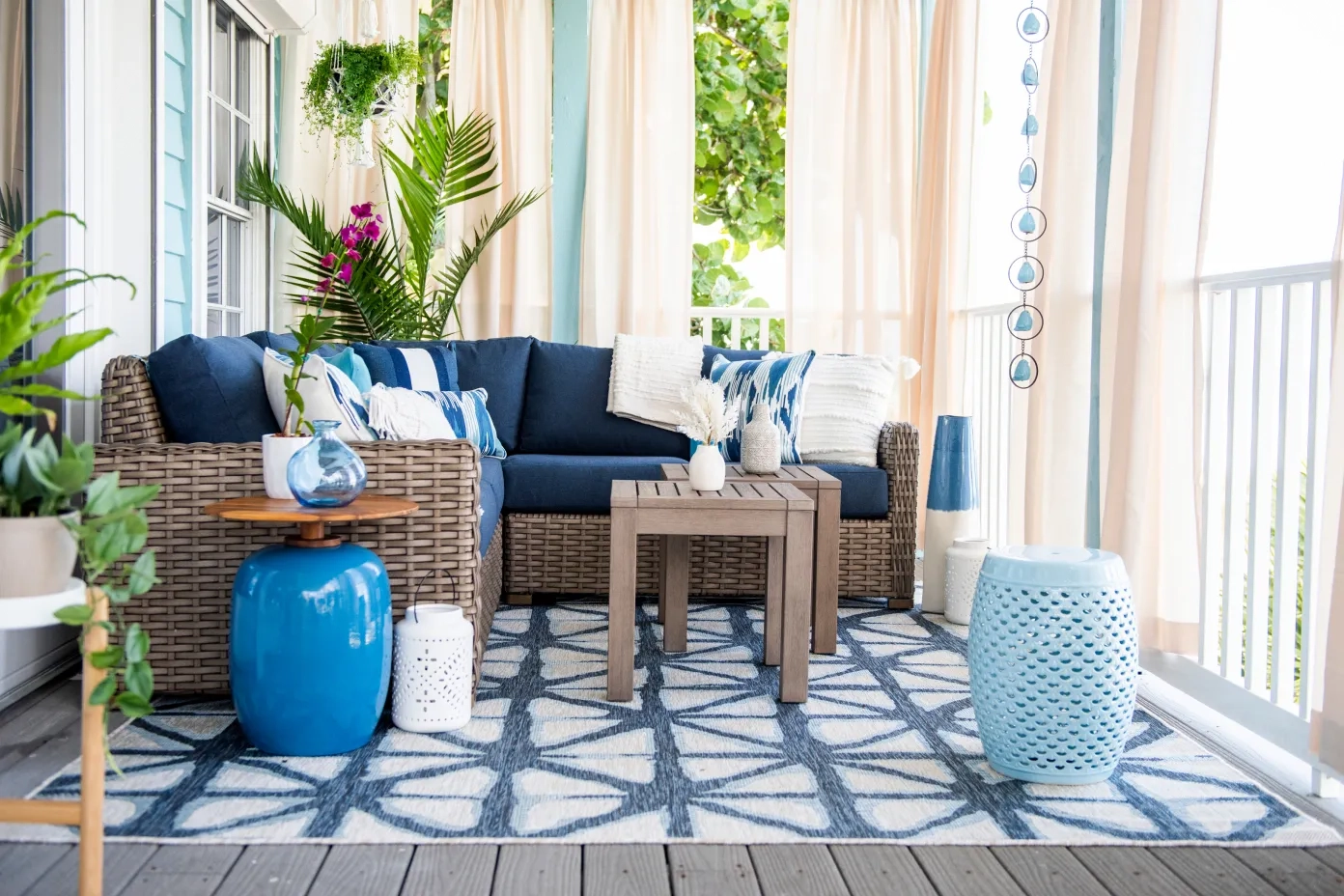 blue and white patio rug under a patio set