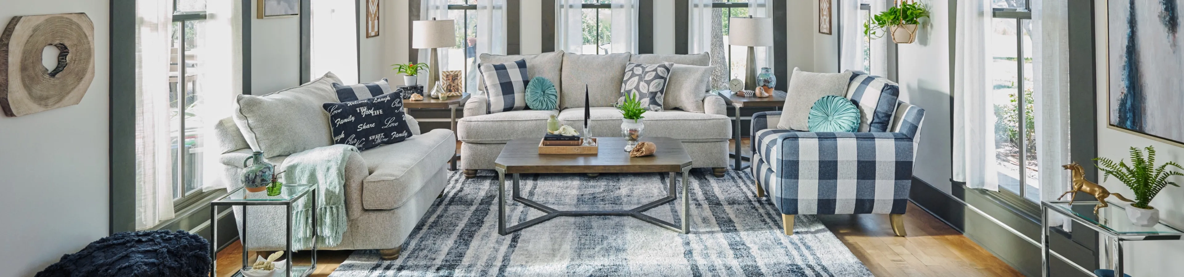 a grey and blue style living room with a gray sofa