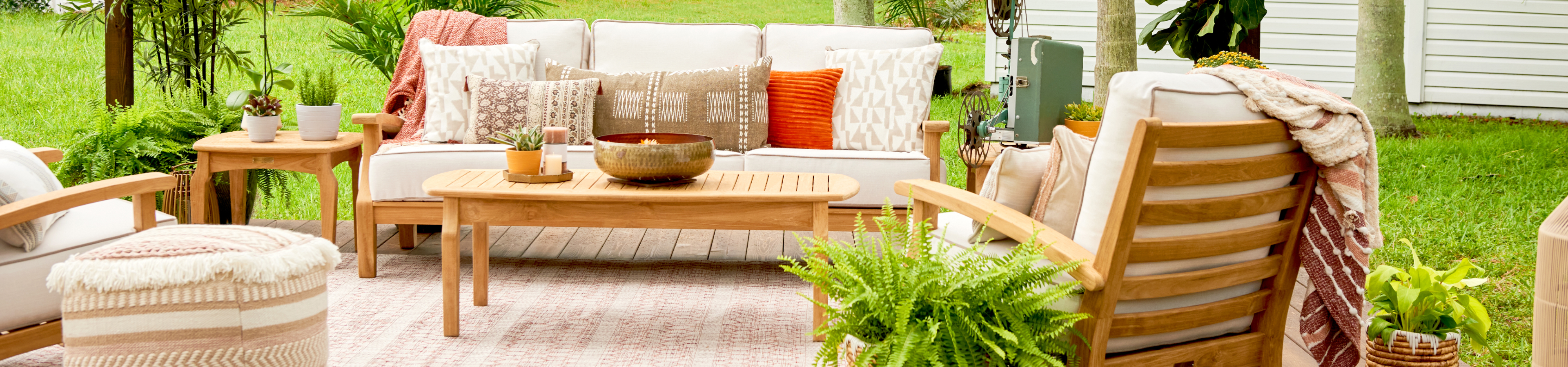 outdoor patio set with a rug underneath 