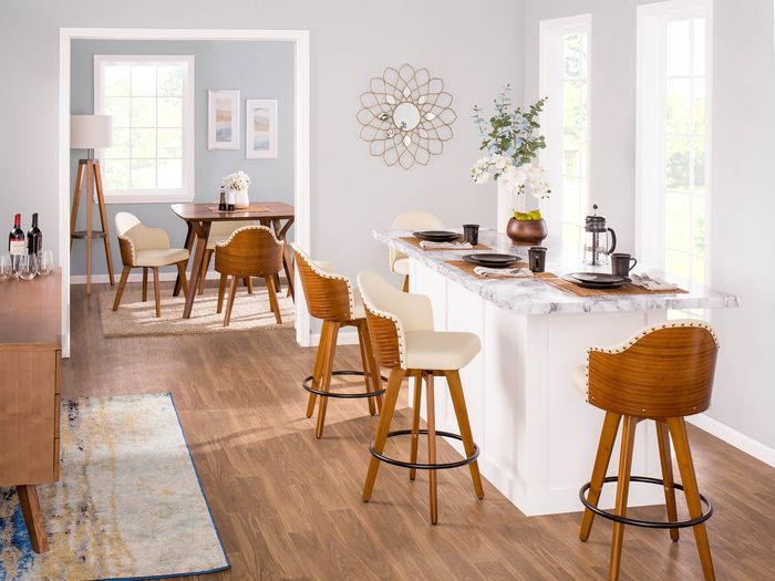 image of a kitchen and dining are with plenty of surfaces and seating