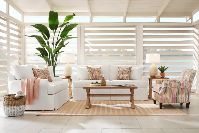 Beachy living room set in white, cream, brown, and other earth tones
