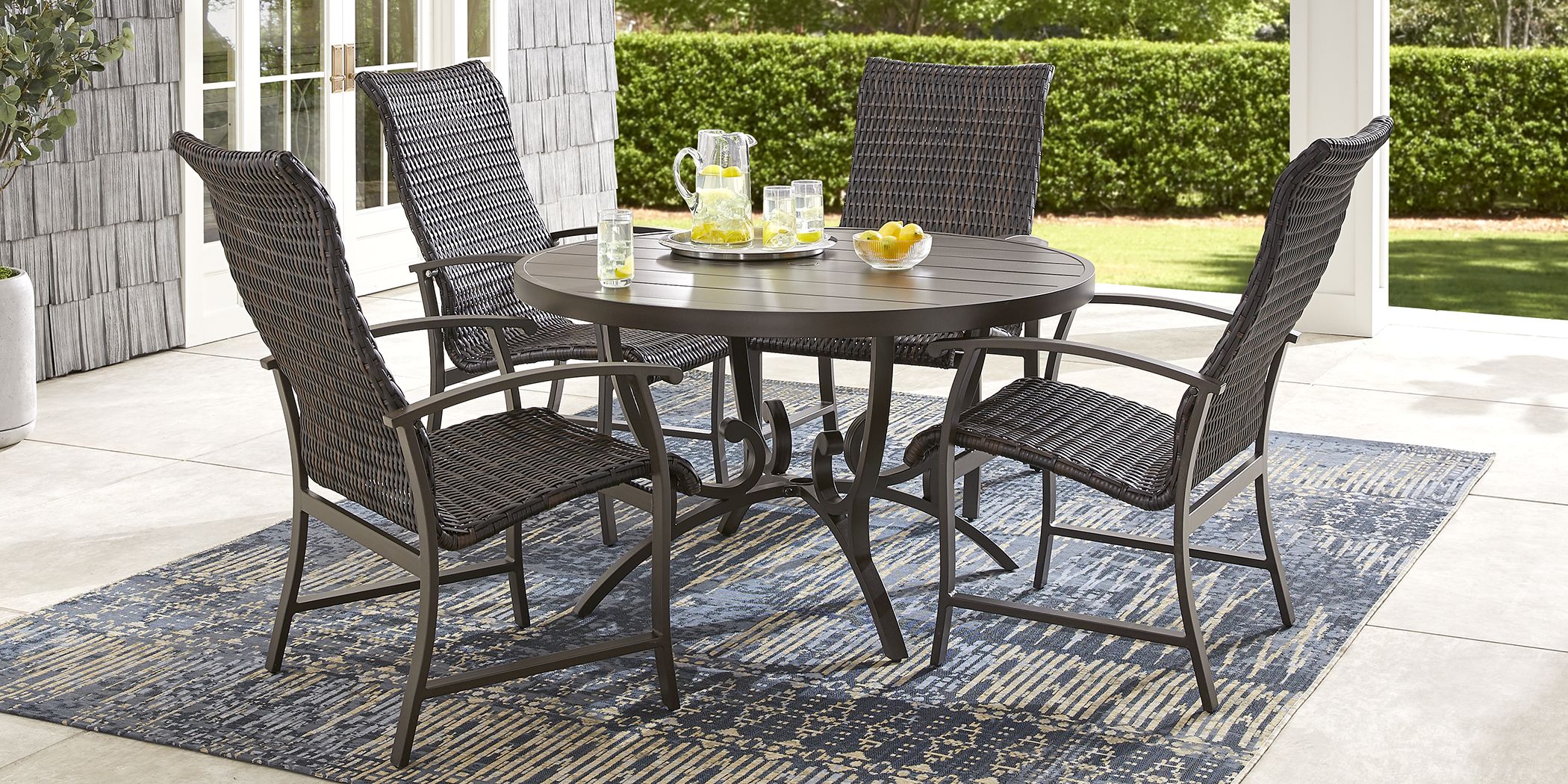 Bermuda Breeze Aged Bronze 5 Pc Round Outdoor Dining Set With Wicker Chairs Rooms To Go