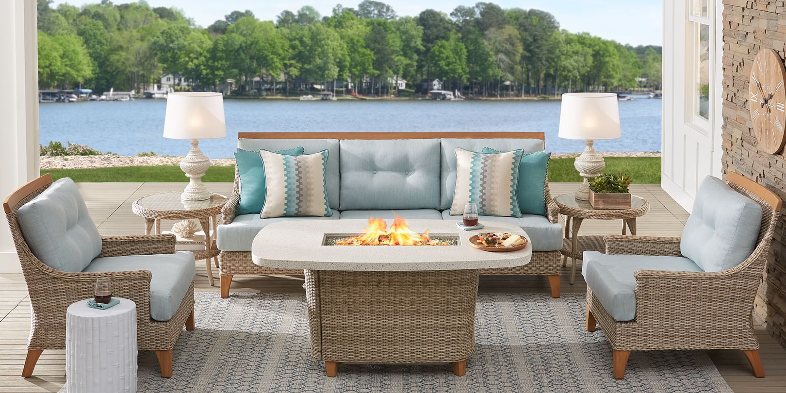 Photo of wicker patio seating set with seafoam cushions