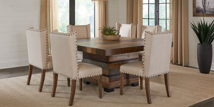 tan dining chairs around wooden dining table