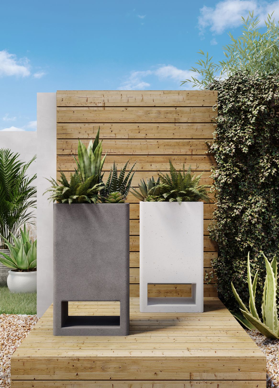 Photo of a wooden platform with two planters, one gray and one white