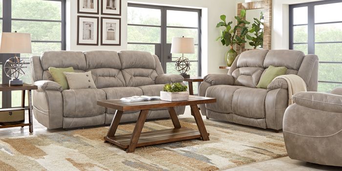 taupe living room with triple reclining sofa