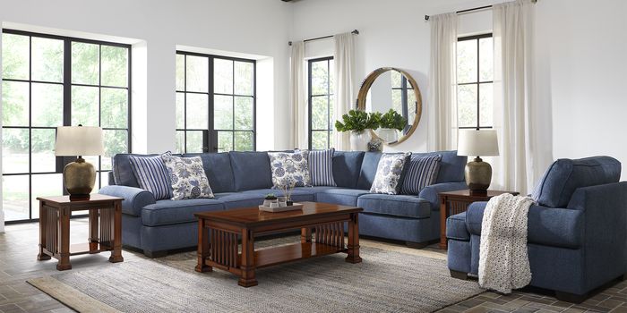 blue sectional sofa with white pillows