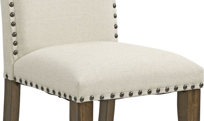 seat of a beige dining chair