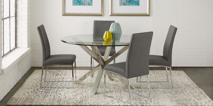 gray chairs around  around glass top standard height dining table