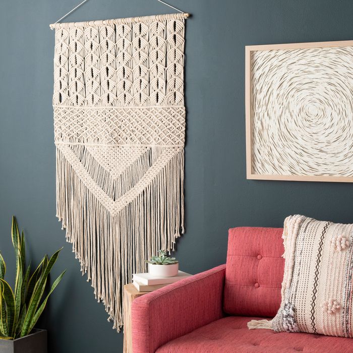 macrame wall hanging in boho-style living room