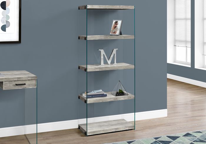 dark gray bookshelf with decorative items