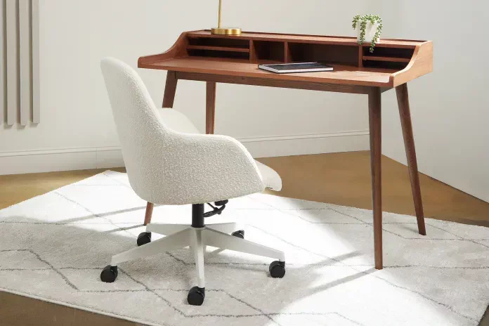 white office chair and tan desk