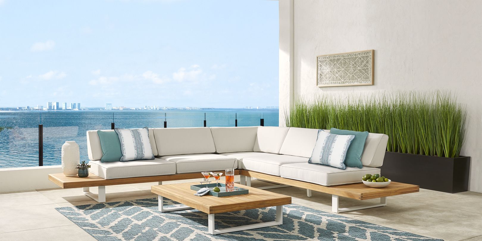 Photo of coastal teak and ivory patio sectional