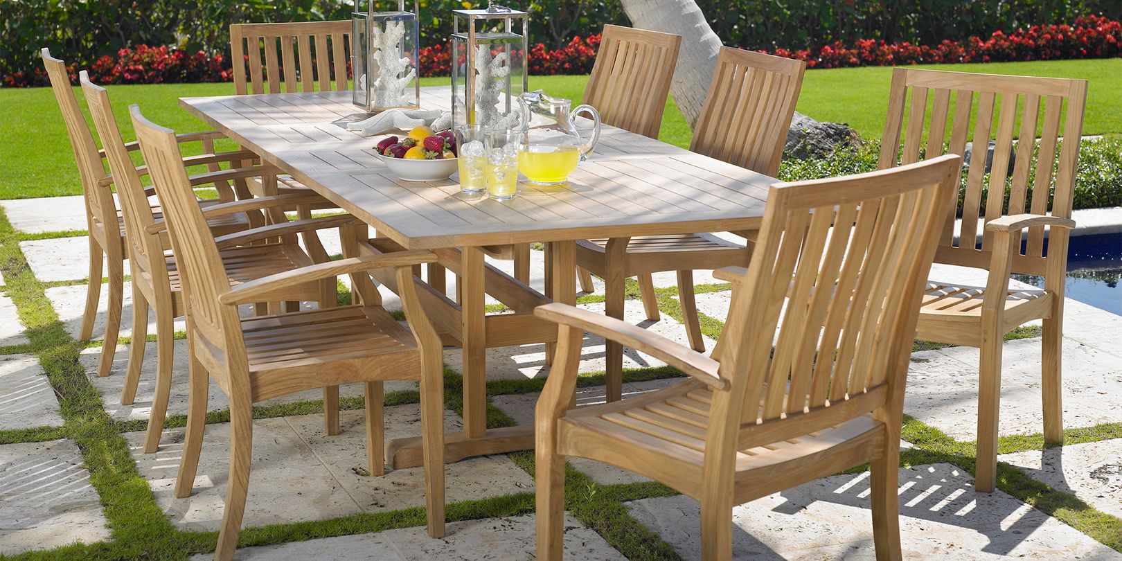 Photo of teak 9 piece outdoor dining set