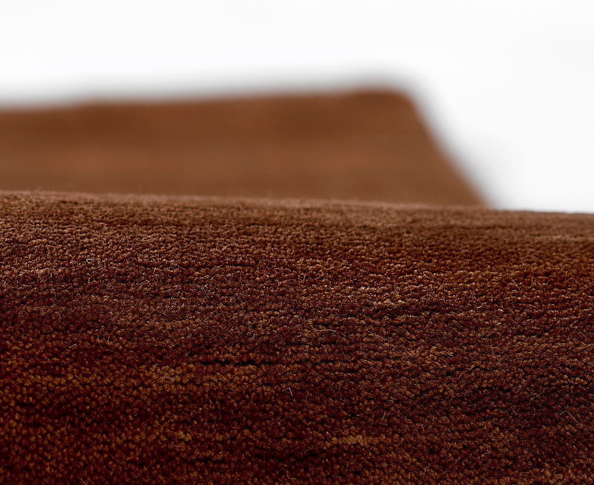 Abogny Copper Brown,Orange,Yellow Rugs | Rooms to Go