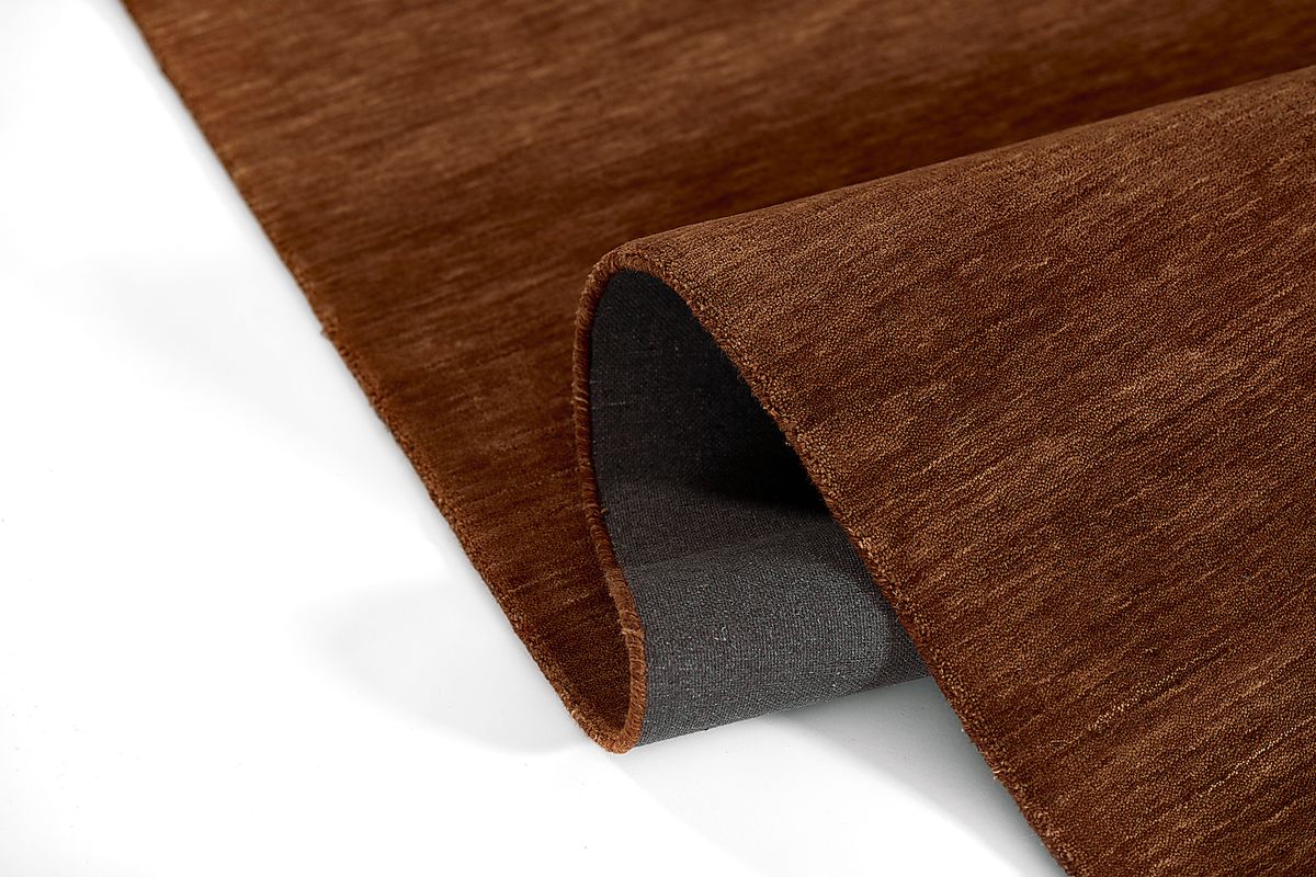 Abogny Copper Brown,Orange,Yellow Rugs | Rooms to Go