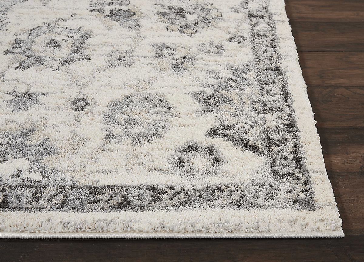 Adelien Cream Beige Polypropylene Fabric Rug | Rooms to Go