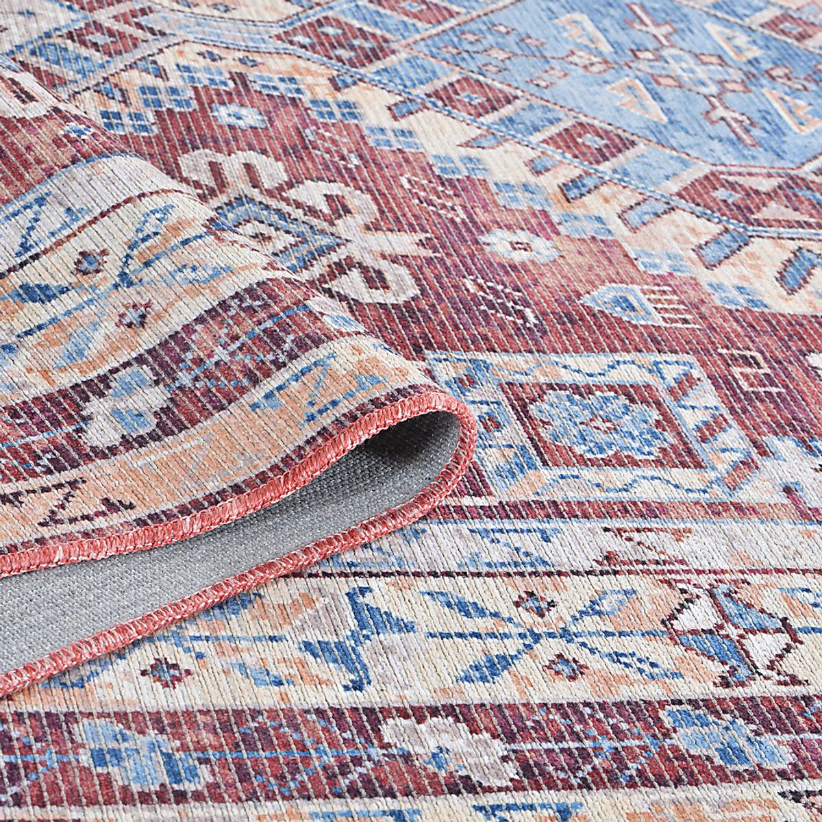 Aebby Red Polyester Fabric Rug | Rooms to Go