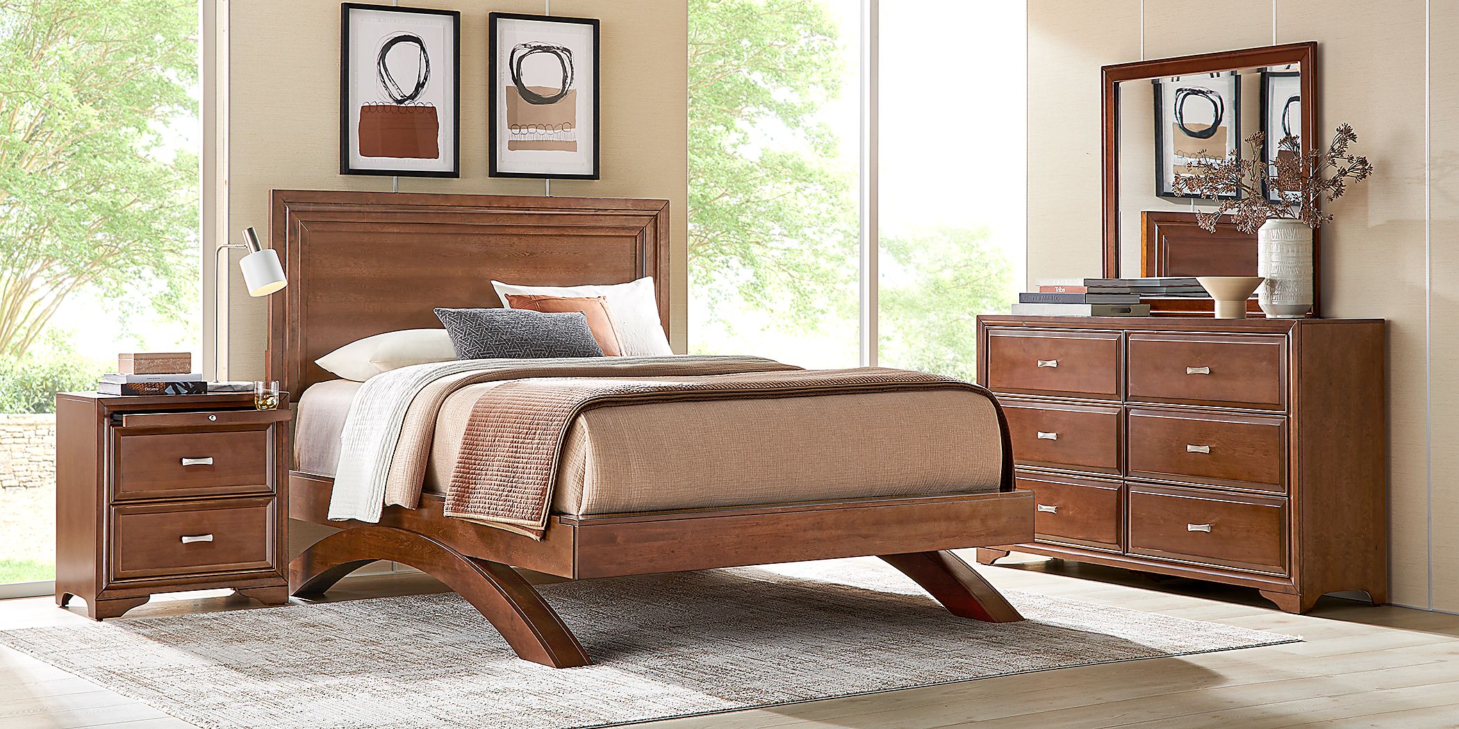 https://assets.roomstogo.com/product/belcourt-brown-cherry-5-pc-queen-panel-arch-bedroom_8465540P_image-room?cache-id=e8bba6f8af49b759a93c5b4b9214e44f