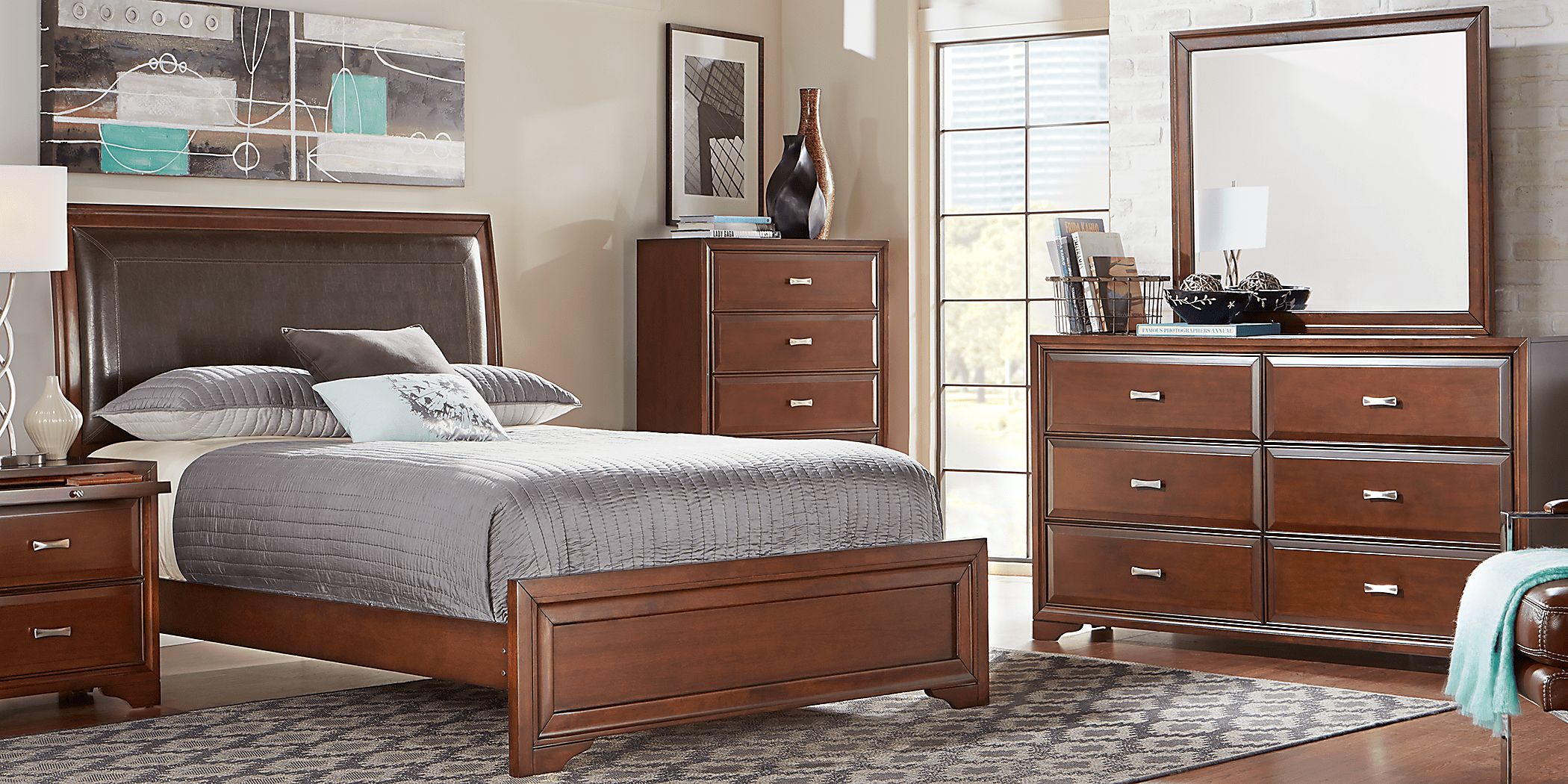 https://assets.roomstogo.com/product/belcourt-brown-cherry-5-pc-queen-upholstered-sleigh-bedroom_8515540P_image-room?cache-id=327ece2d6039be3e184f1129688a650a