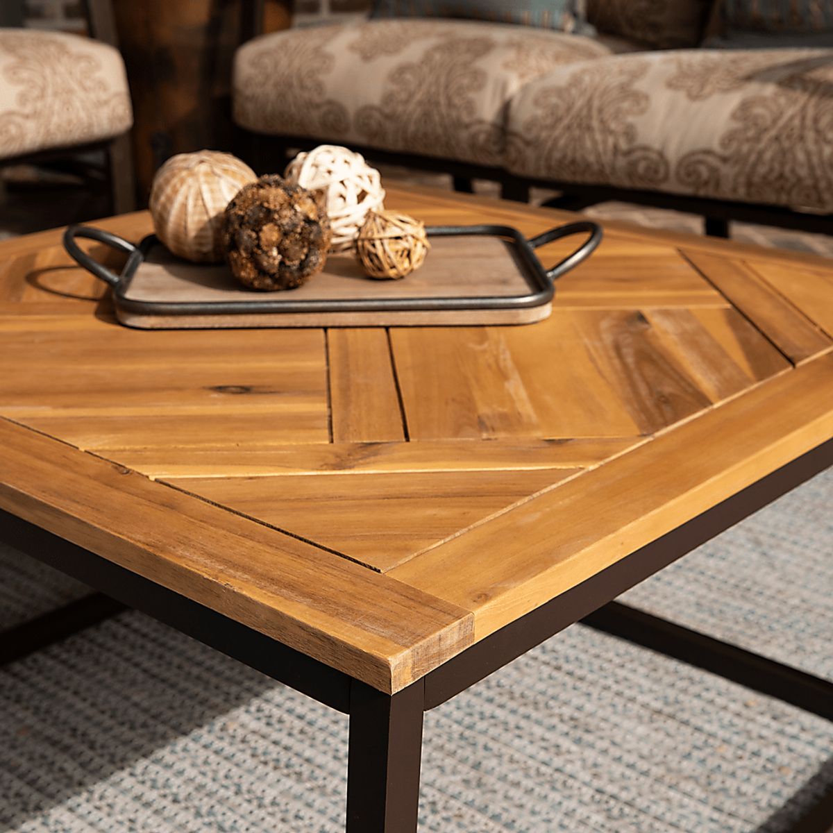 Beraga Brown Dark Wood Outdoor Cocktail Table | Rooms to Go