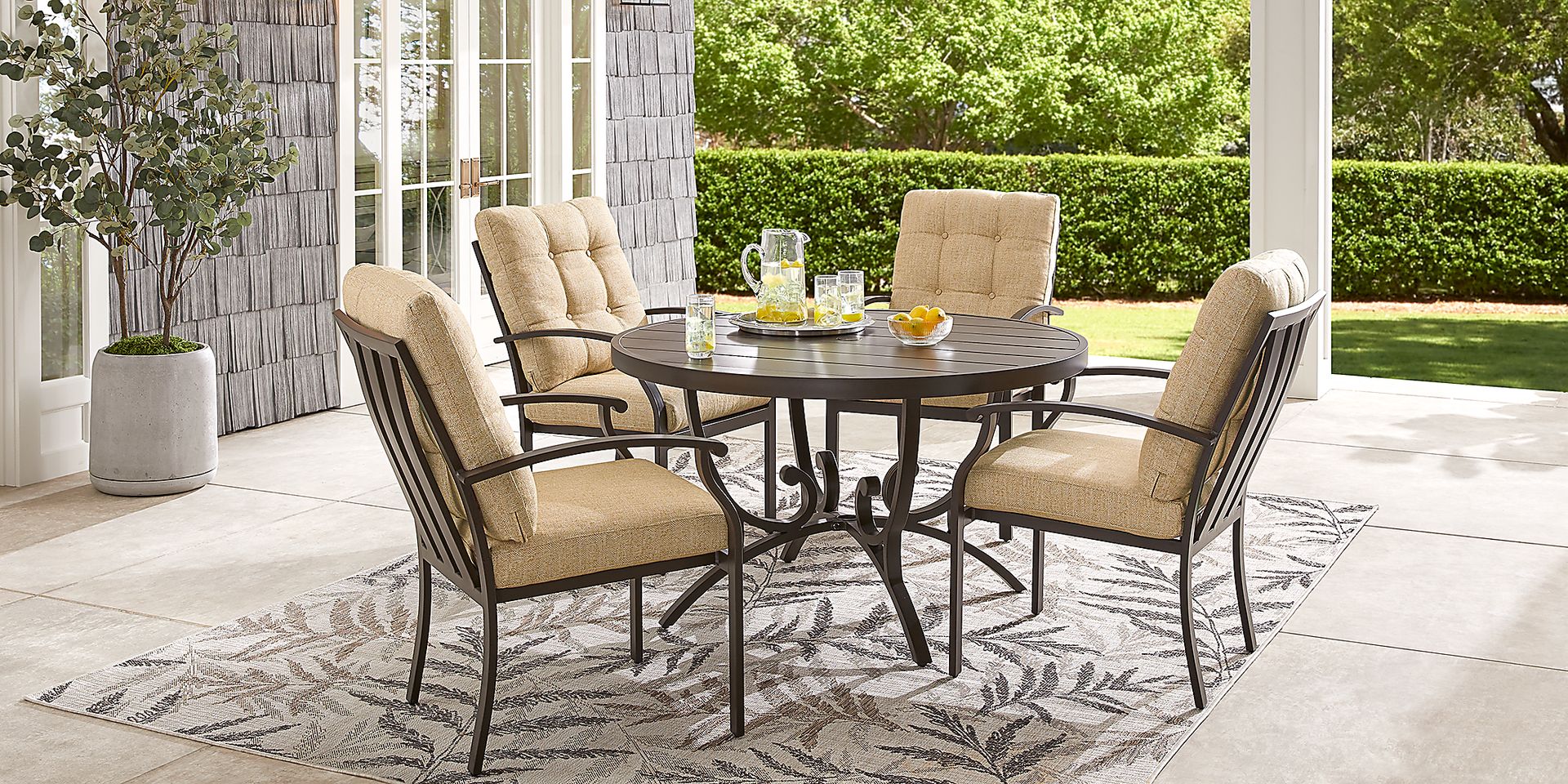 Bermuda Breeze Aged Bronze 5 Pc Round Outdoor Dining Set with Straw Cushions - Image 1