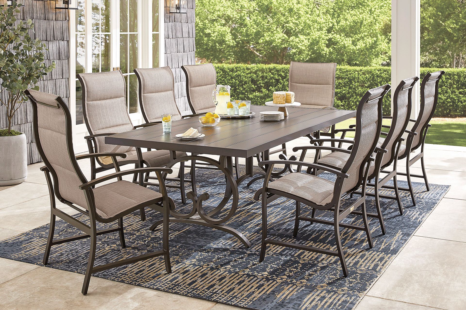 Lake Breeze Aged Bronze 9 Pc Outdoor 90 in. Rectangle Dining Set with Sling Chairs - Image 1