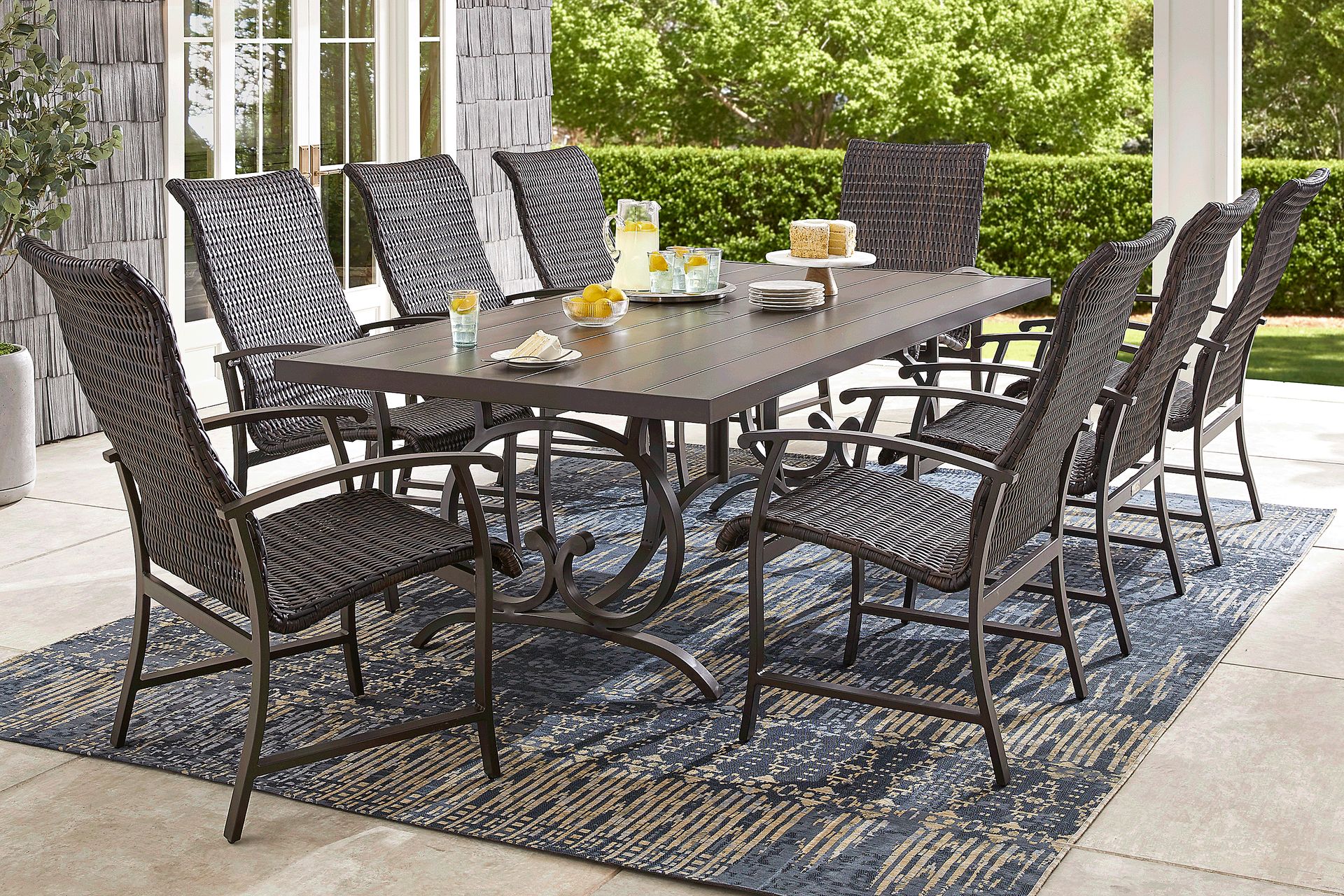 Lake Breeze Aged Bronze 9 Pc Outdoor 90 in. Rectangle Dining Set with Wicker Chairs - Image 1