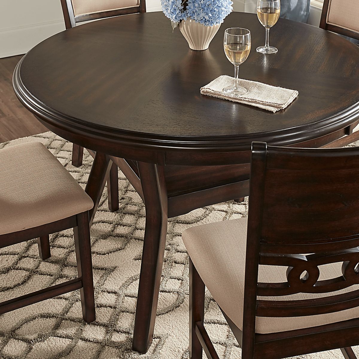 Brookgate Brown Cherry Dark Wood Round Dining Table | Rooms to Go