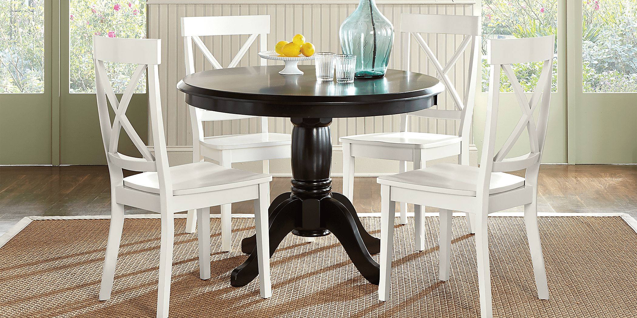 Dark wood dining discount table with white chairs