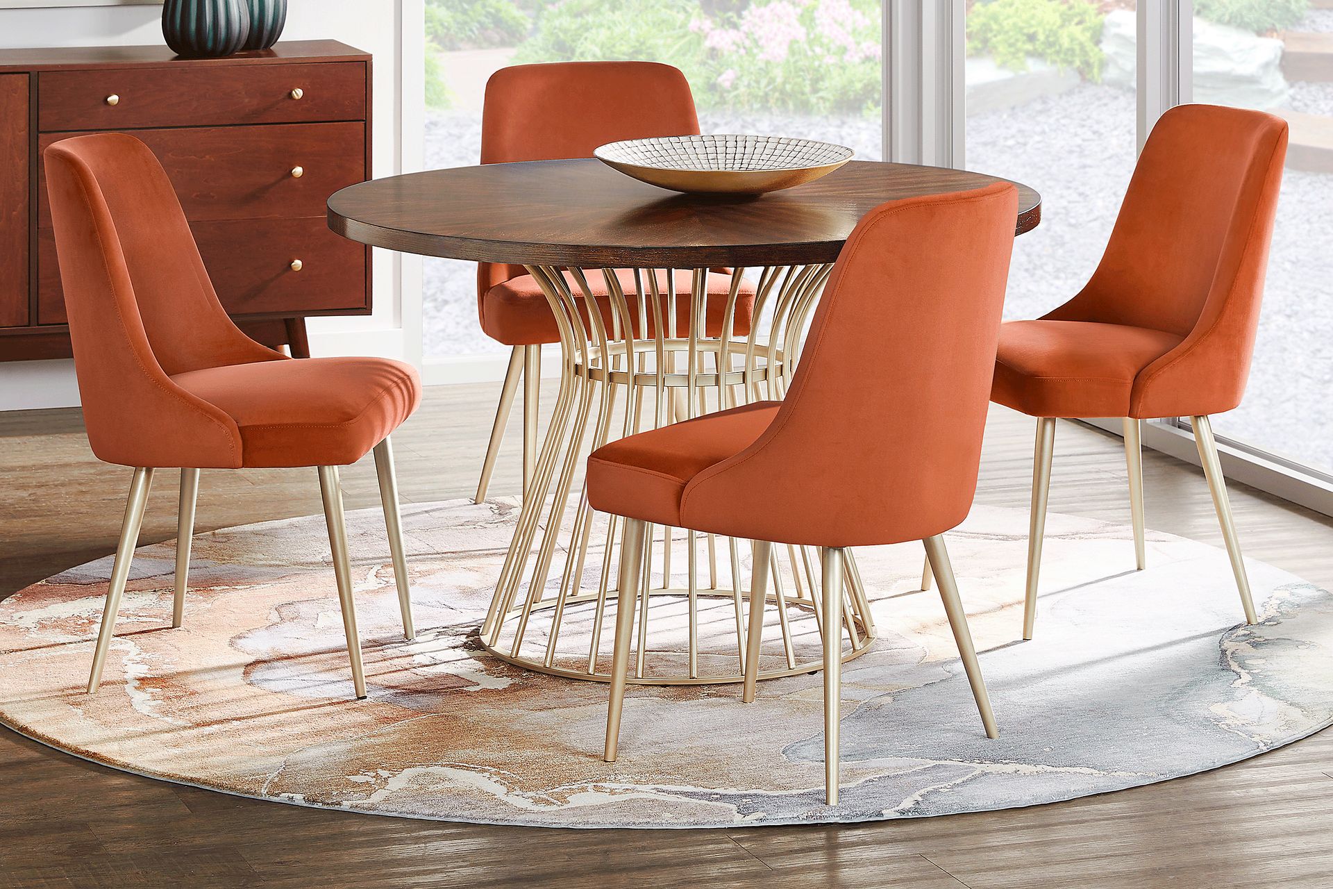 Calisi Brown 5 Pc Round Dining Room with Orange Chairs - Image 1