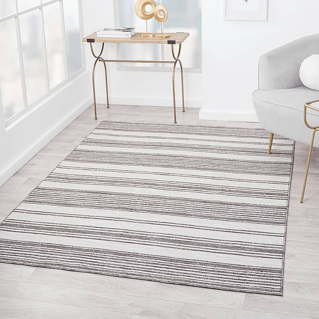Caradley Ivory 5' x 7' Indoor/Outdoor Rug - Thumbnail - Image 2