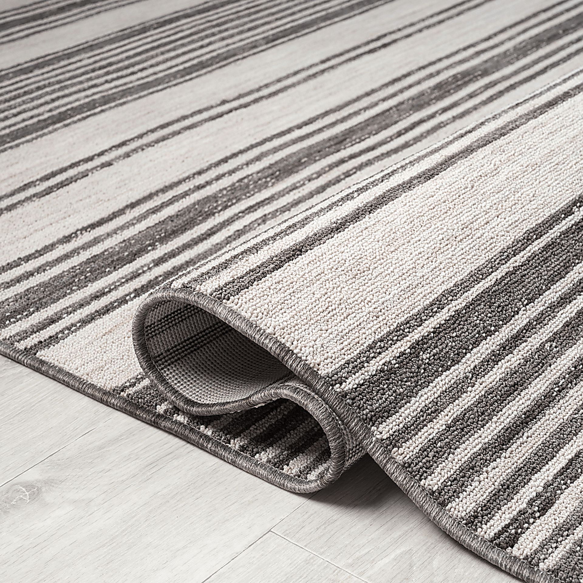 Caradley Ivory 5' x 7' Indoor/Outdoor Rug - Image 3