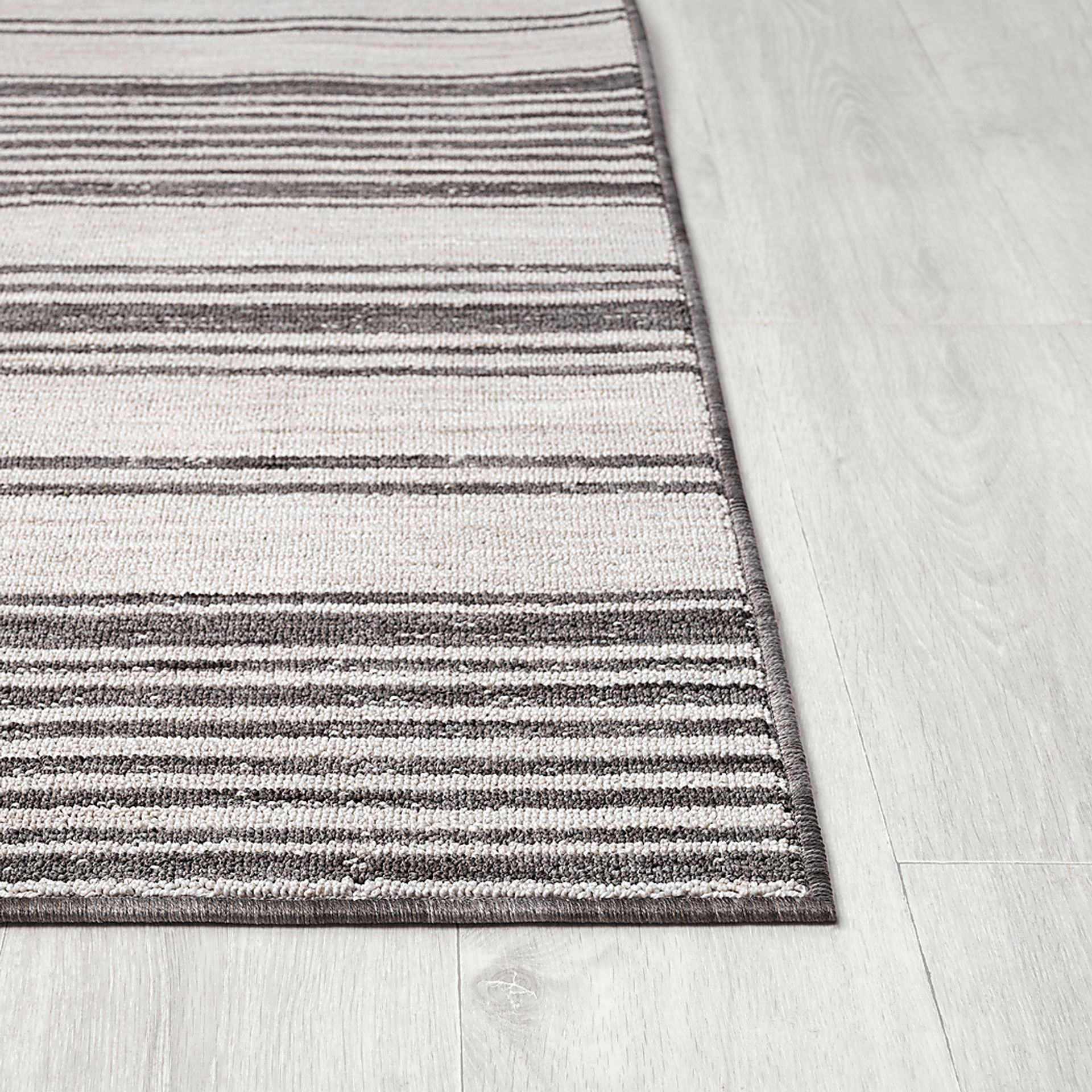 Caradley Ivory 5' x 7' Indoor/Outdoor Rug - Image 4