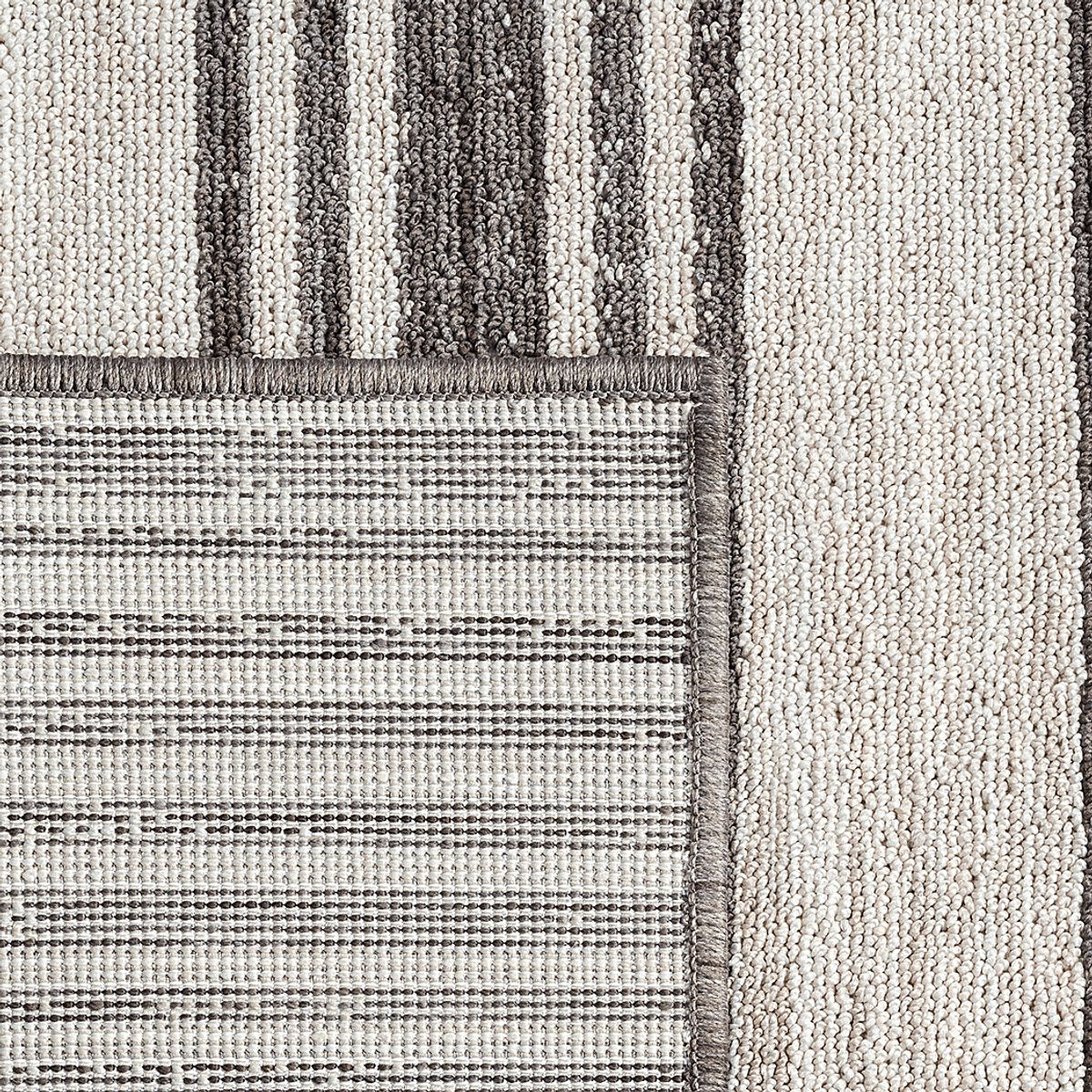 Caradley Ivory Beige Outdoor Rugs | Rooms to Go