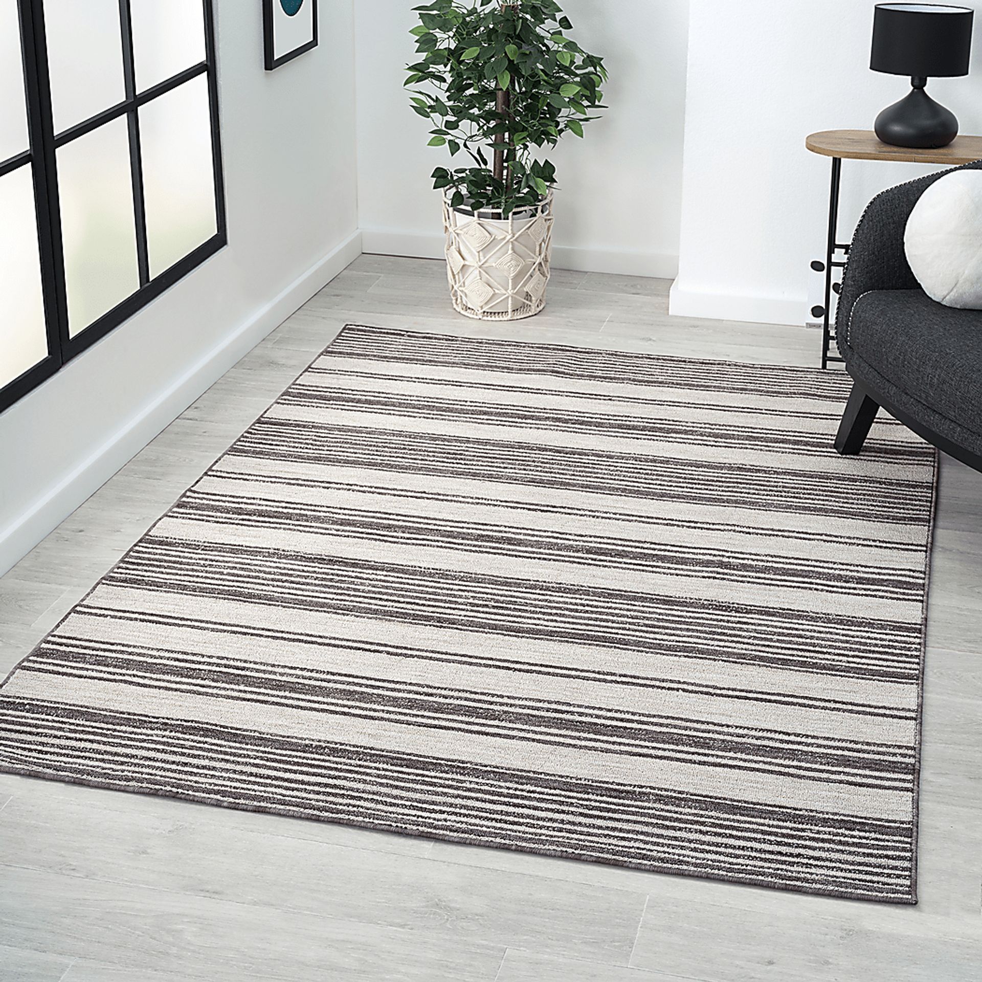 Caradley Ivory 5' x 7' Indoor/Outdoor Rug - Image 7