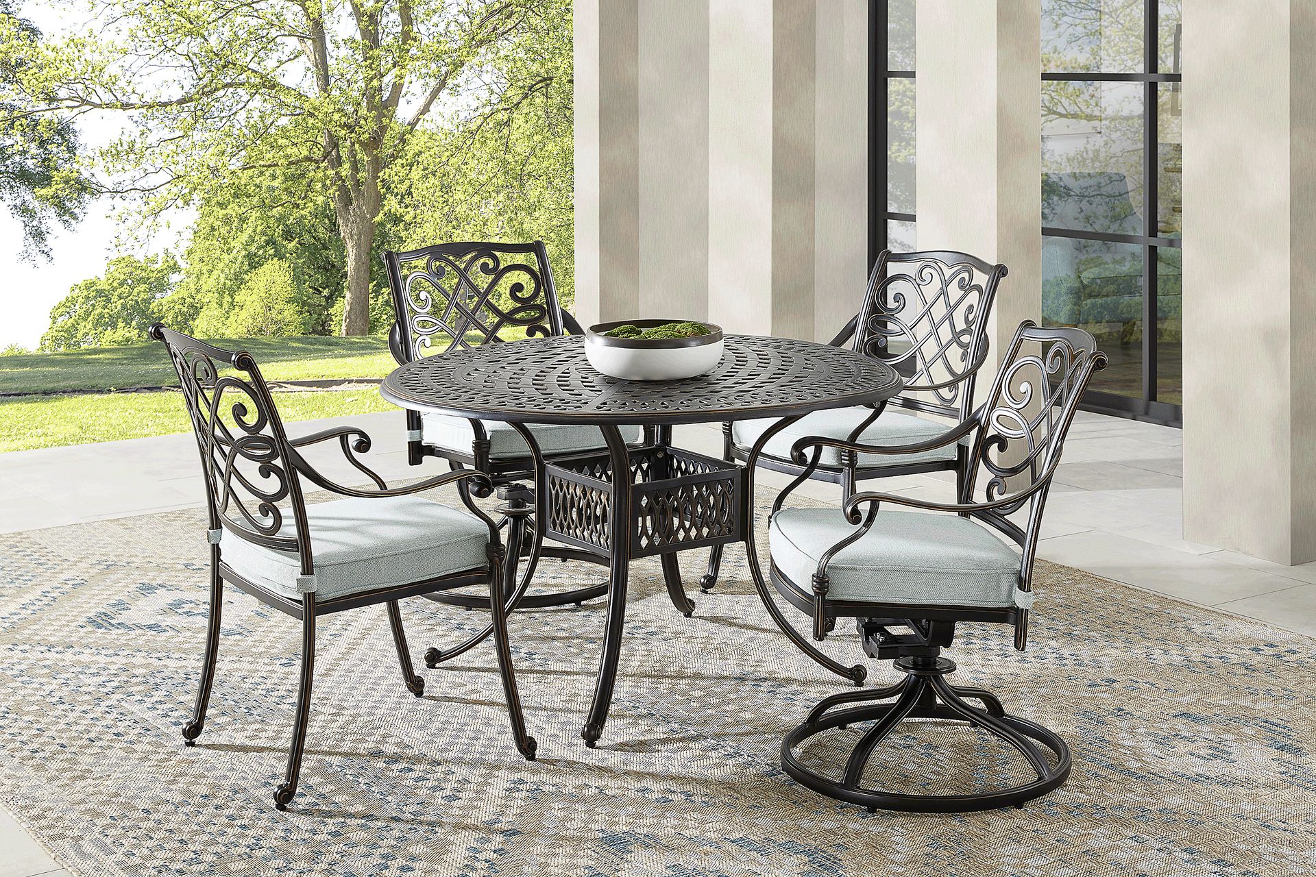 Carina Bronze 5 Pc 48 in. Round Outdoor Dining Set with Sky Cushions - Image 1