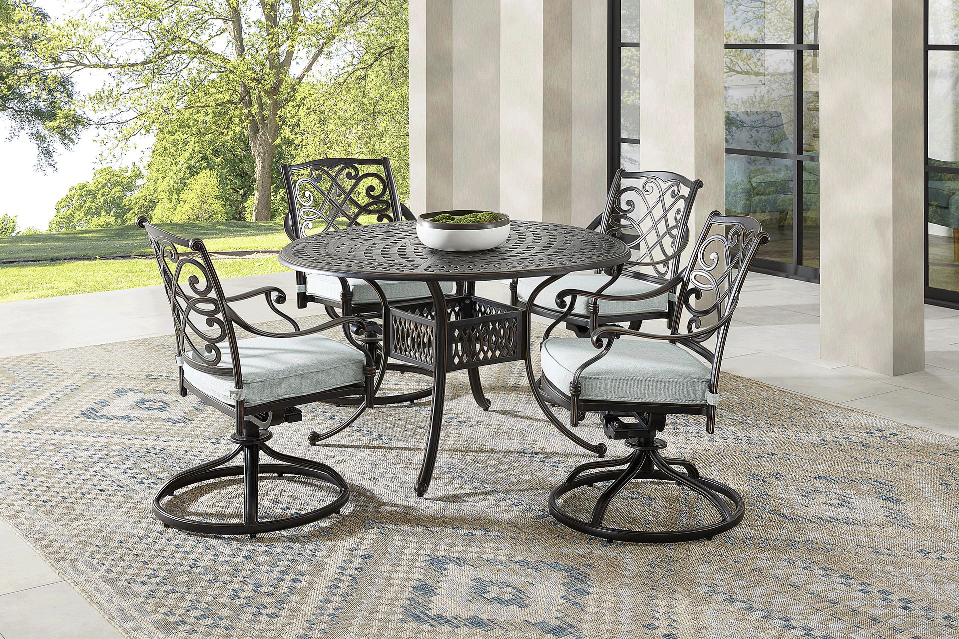 Carina Bronze 5 Pc 48 in. Round Outdoor Dining Set with Sky Cushions - Image 1