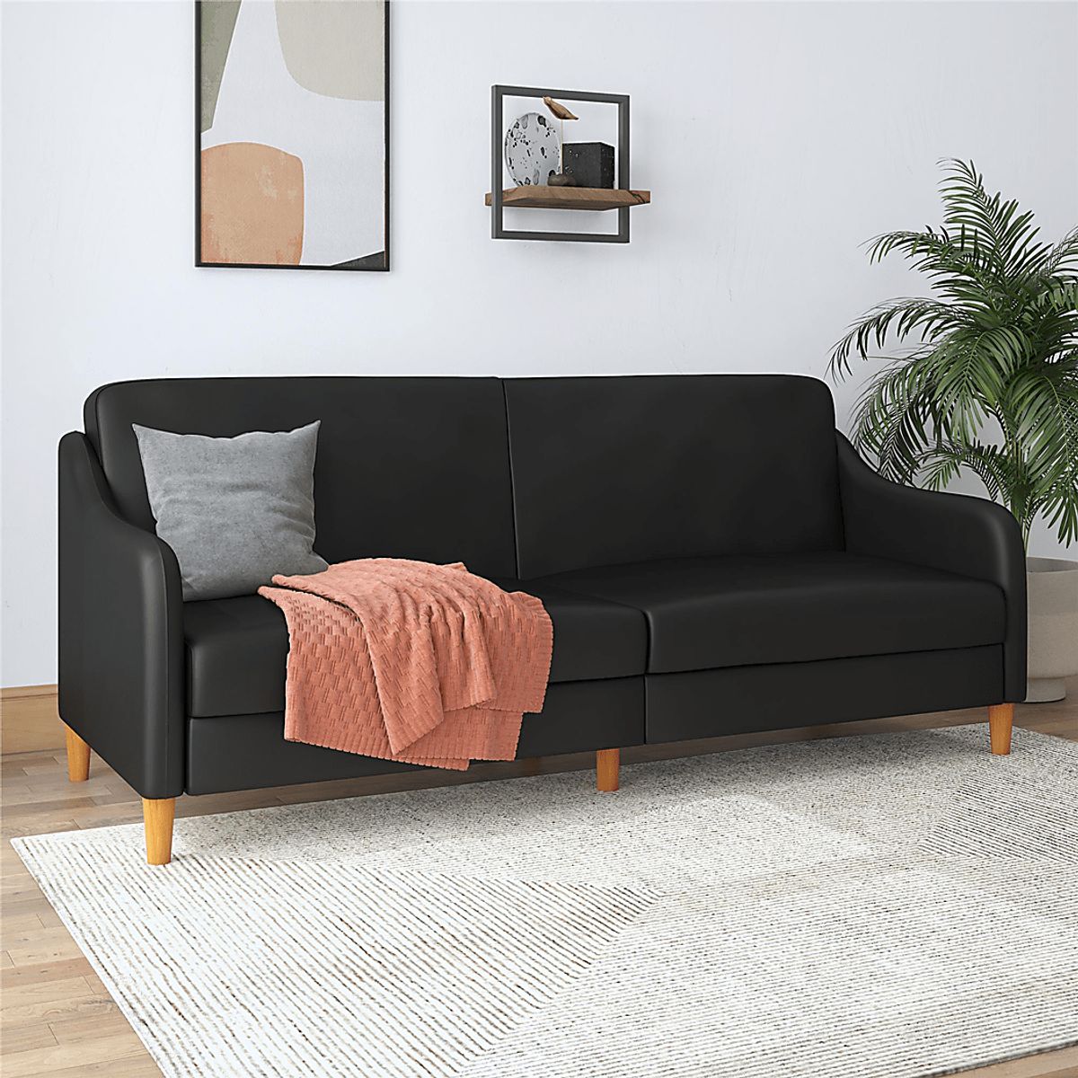 Chinauld I Black Faux Leather Fabric Futon | Rooms to Go