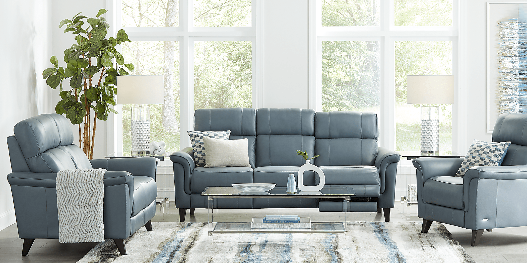 Cindy Crawford Avezzano Blue Leather Dual Power Reclining Sofa Rooms to Go