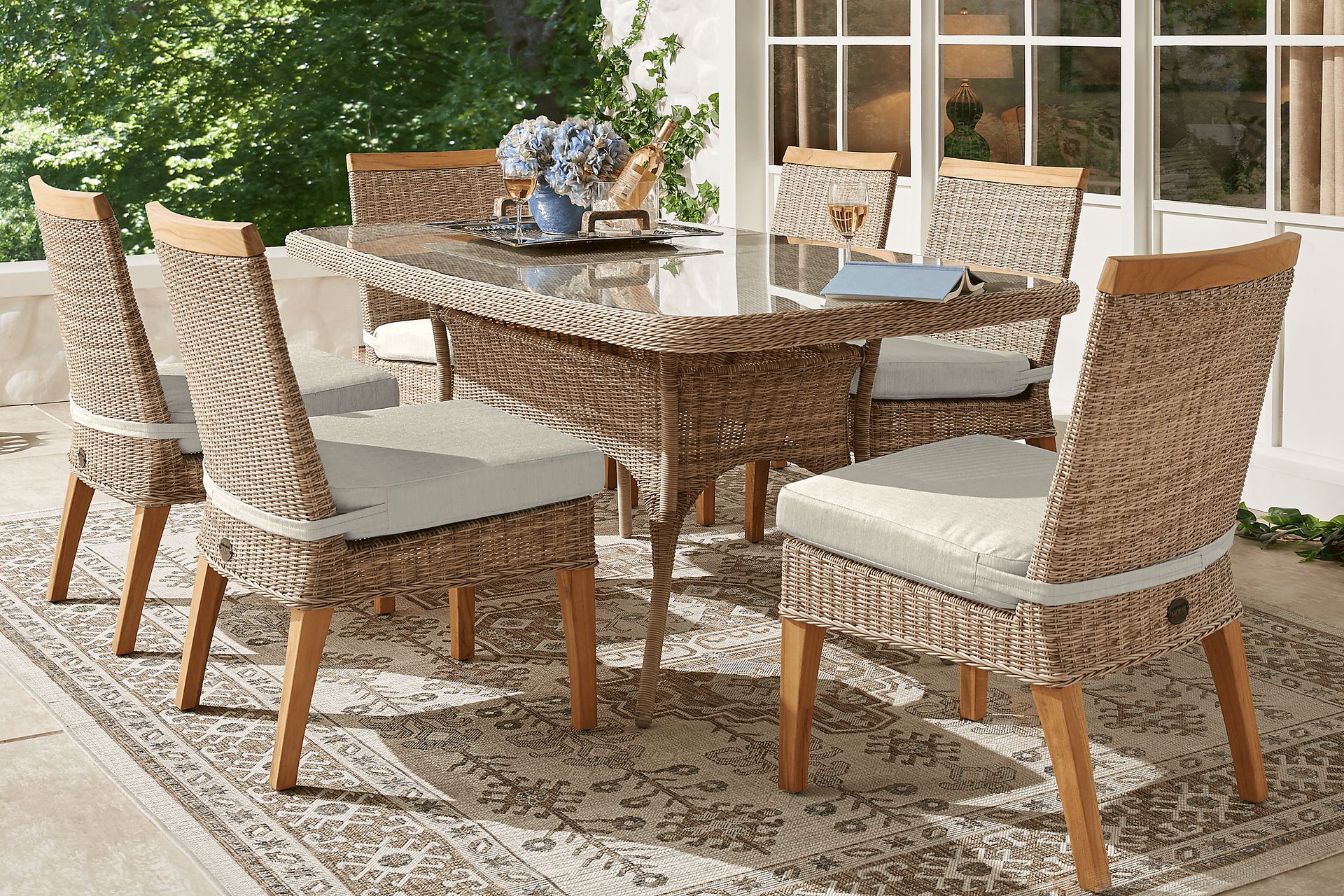 Cindy Crawford Home Hamptons Cove Gray 7 Pc Rectangle Outdoor Dining Set with Rollo Seafoam Cushions - Image 1