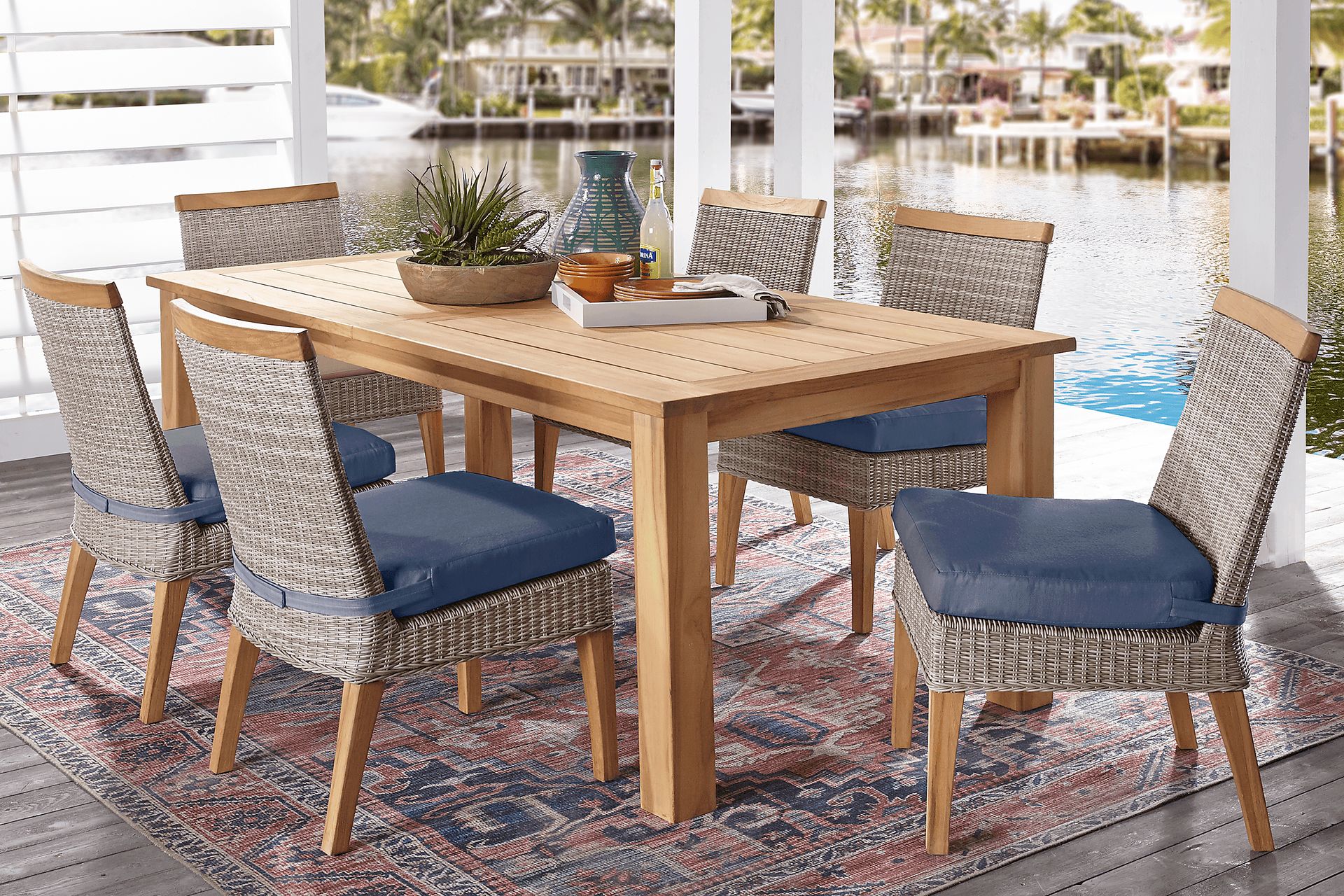Cindy Crawford Home Hamptons Cove Teak 7 Pc Rectangle Outdoor Dining Set with Denim Cushions - Image 1