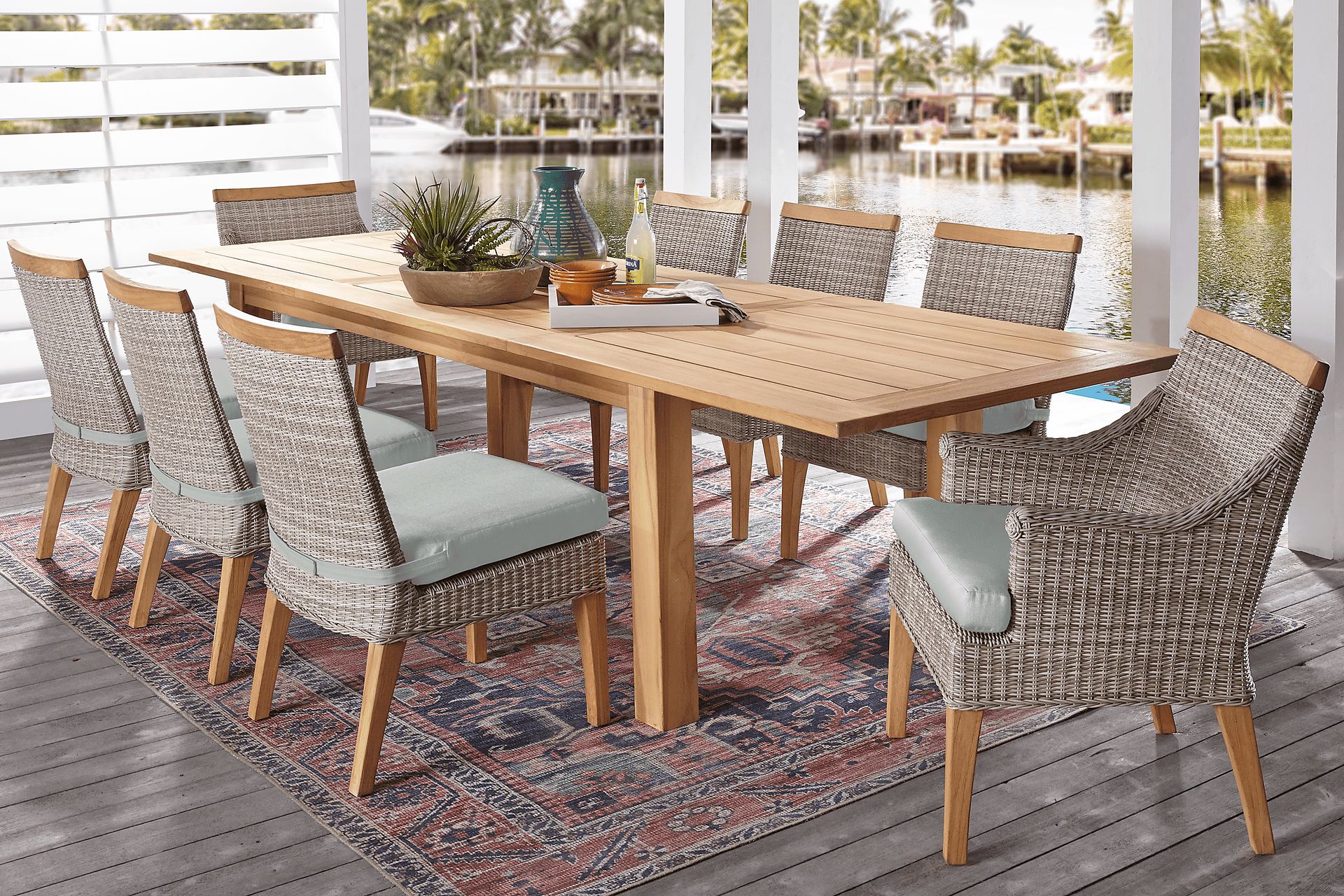 Cindy Crawford Home Hamptons Cove Teak 9 Pc Rectangle Outdoor Dining Set with Rollo Seafoam Cushions - Image 1