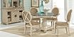 Cindy Crawford Home Key West Sand 5 Pc Round Dining Room with Oval Chairs