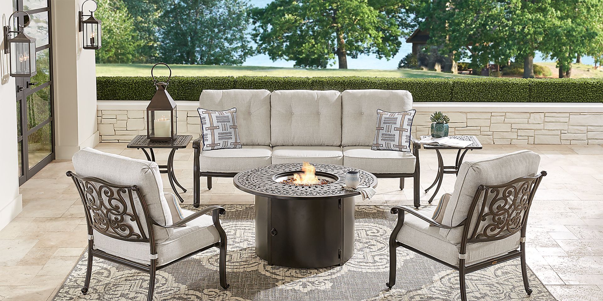 Cindy Crawford Home Lake Como Antique Bronze 4 Pc Outdoor Fire Pit Set with Ash Cushions - Image 1